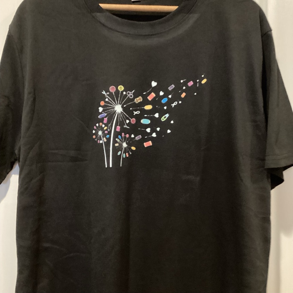 Boutique: Black Graphic woman’s sewing  T-Shirt